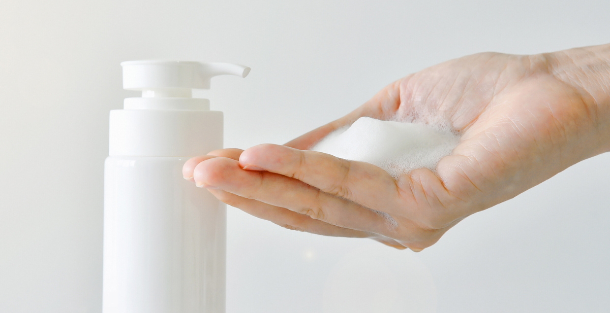 Bulk container of EcoSoft Foam Hand Soap refill for commercial dispensers, showing rich foam texture.